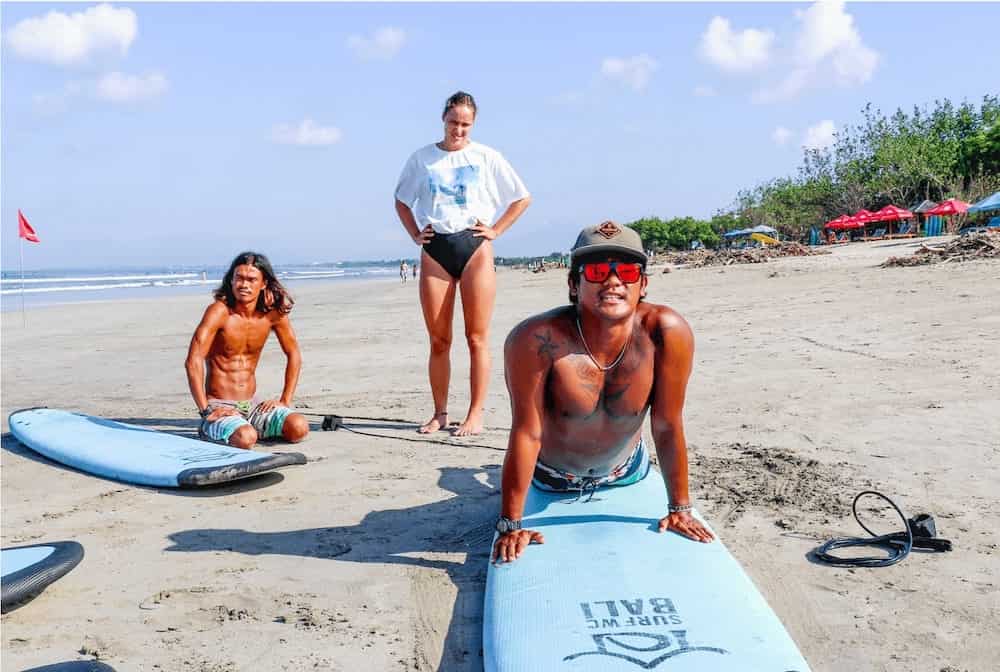 SurfWG beginner surf course on the beach