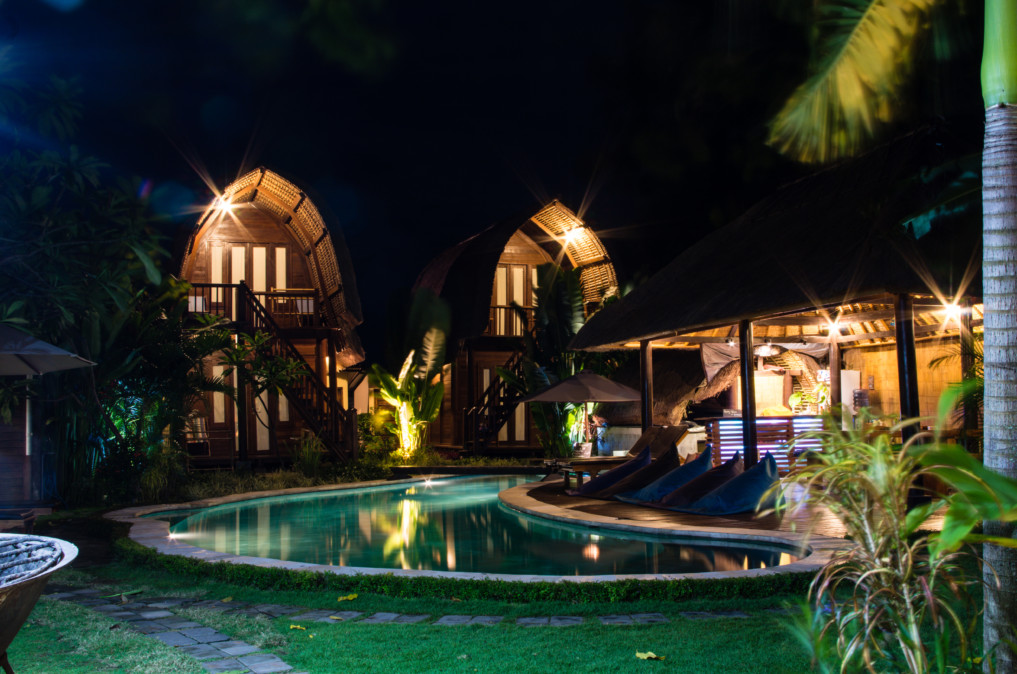 SurfWG grounds at night, pool and lounge area