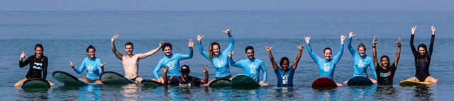 A SurfWG guest group in the water after a surf session